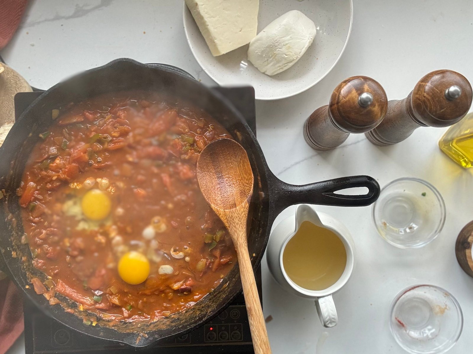 High Protein Shakshuka cooking eggs