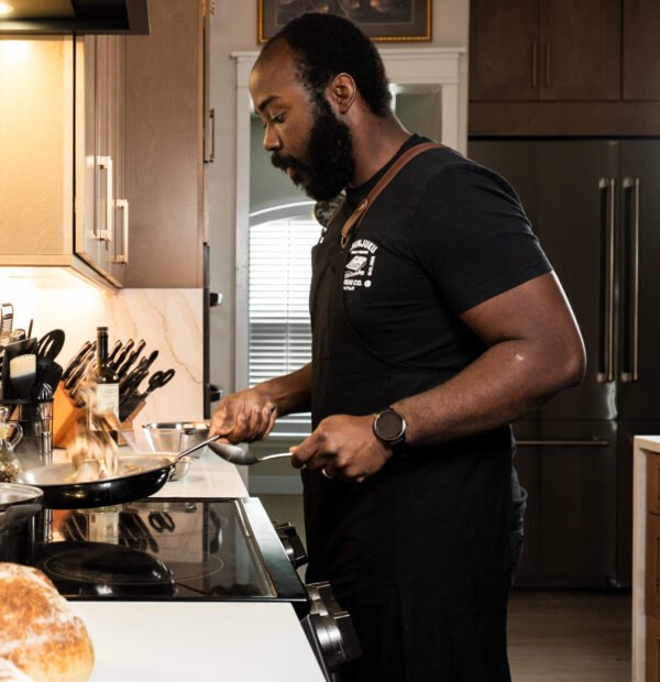 Rufus cooking in the kitchen