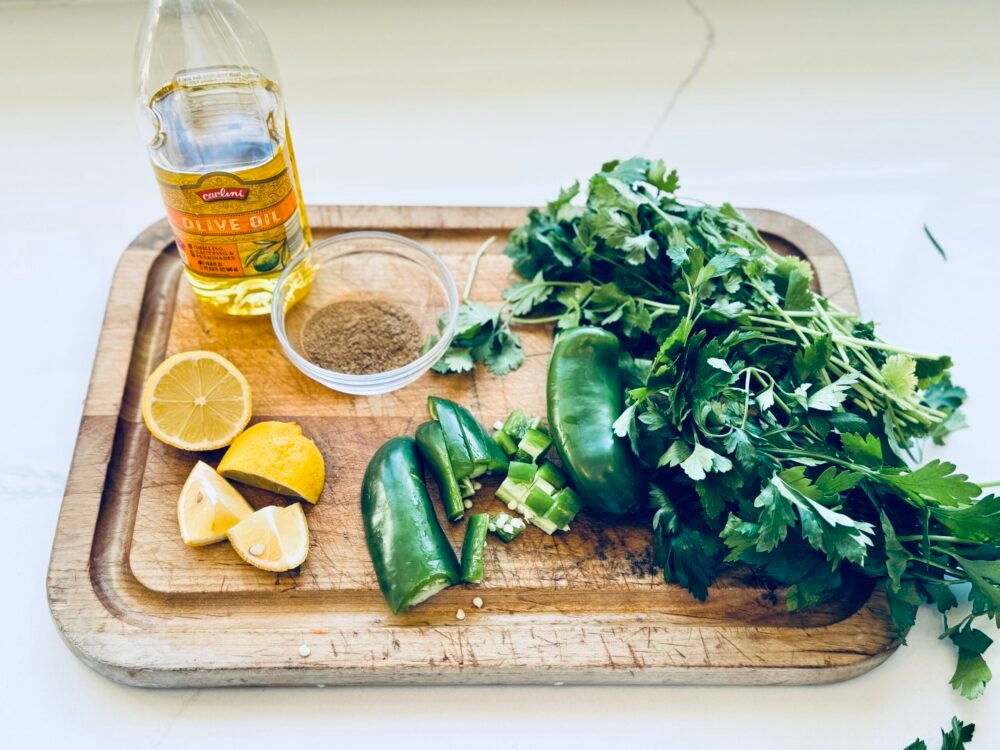 Zhough Sauce Ingredients on a cutting board