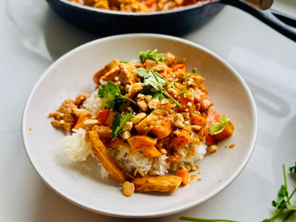 Panang Curry served over rice close up shot