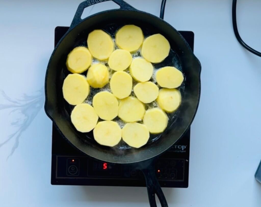 Thin cut melting potatoes process