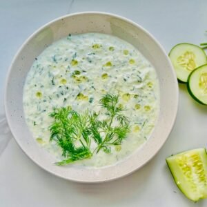 Tzatziki Sauce with cut up cucumbers on the side