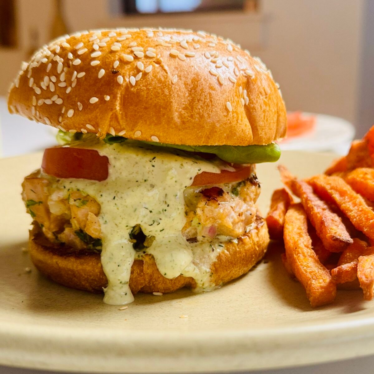 Salmon Burger with Old Bay Dill Secret Sauce with sweet potato fries