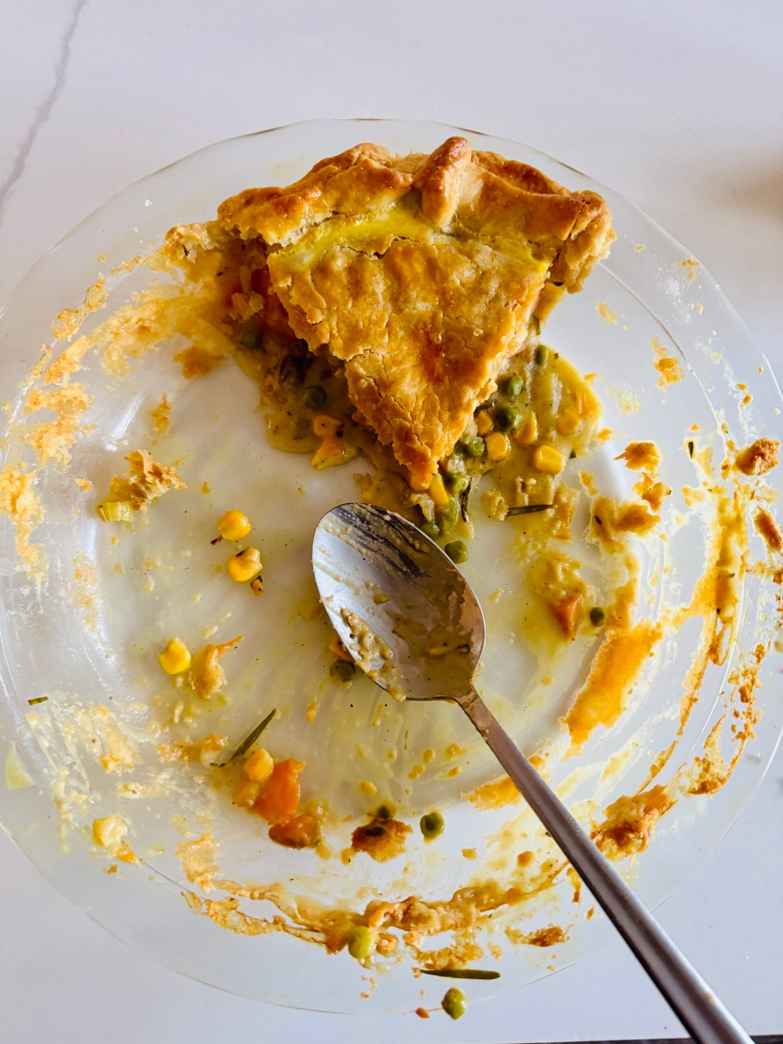 Easy Vegetable Pot Pie with on slice left in baking dish