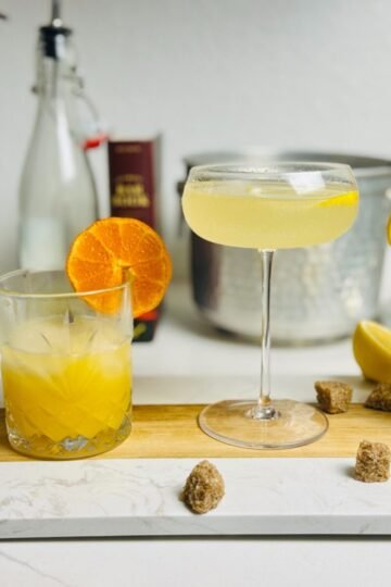 Lemon oleo-saccharum drinks: grapefruit spritz, rum punch, French 75, and lemonade.